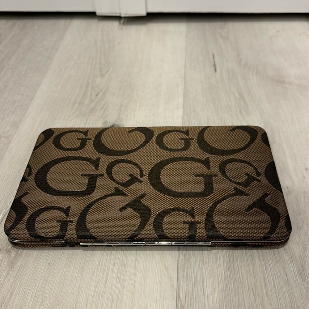 JC Fashion NWT Long hard Wallet with many credit Card compartment and pockets.